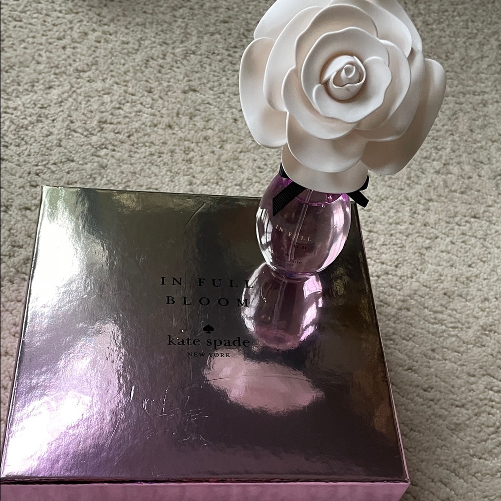 Kate Spade In Full Bloom Perfume with Pink Bottle and White Flower Cap.  1oz